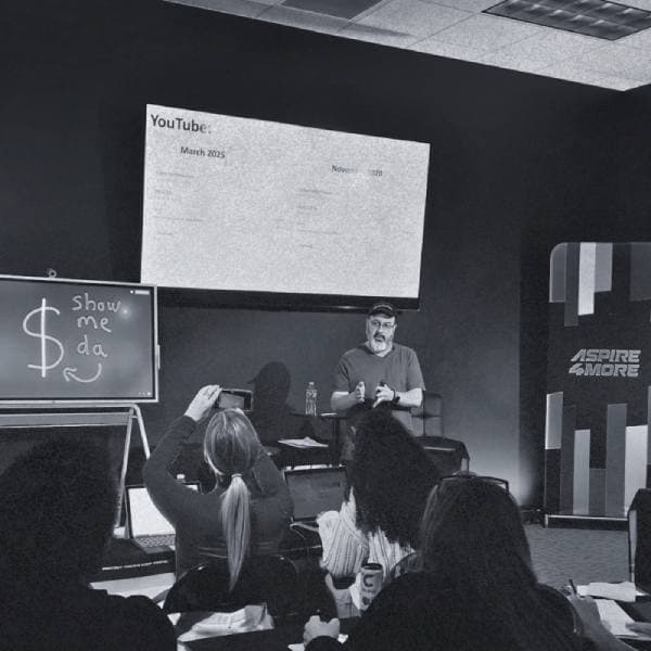 Liron presenting at a corporate workshop